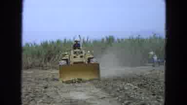 Pueblo Mexico (1965): Bulldozer Plowing Fields