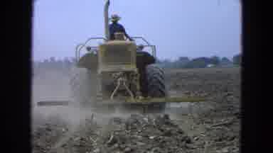 Pueblo Mexico (1965): Solo Farmer Using A Tractor And An Attached Tiller To Till