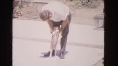 Barstow California USA (1966): Dog Is Being Trained By Its Owner In The House