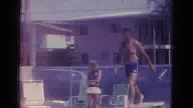 Busche Gardens Florida (1966): A Woman In A Bathing Suit And A Man Jumping In The