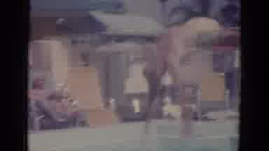 Busche Gardens Florida (1966): Two Adult Men Take Turns Diving Into The Clear