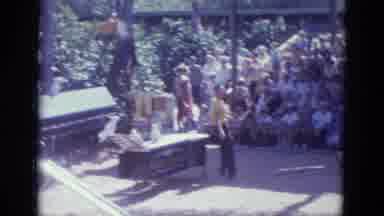 Busche Gardens Florida (1966): Tropical Bird Flies To A Perch While Onlookers