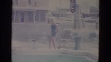 Busche Gardens Florida (1966): Woman In Swimsuit And Swimming Cap Walks Out Of The