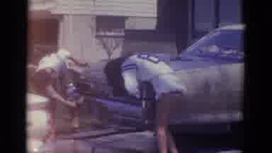 Busche Gardens Florida (1966): Two Physically Attractive Women Washing A Car
