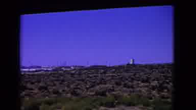California USA (1966): Driving By An Industrial Plant Set In The Distance