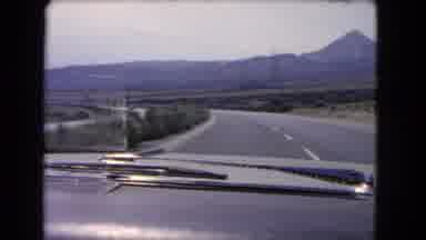 California USA (1966): A Car Is Going Alone In A Beautiful Street With Perfect