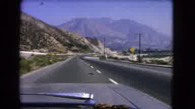 California USA (1966): Family Driving Along Sunny Beautiful Highway With Stunning
