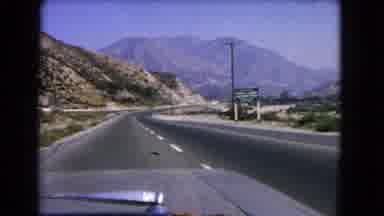 California USA (1966): A Man Driving On The Highway