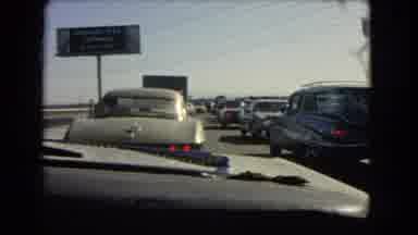 California USA (1966): Driving Down The Tollway Stuck In Traffic On A Warm Summer