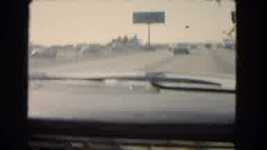 California USA (1966): Driving Down The Highway As It Looks Like A Somewhat Busy