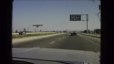 California USA (1966): Driving On The Motorway Heading Towards Wilmington Behind
