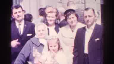 Danville Illinois (1966): A Family Are All Dressed Up Outside For Girls Holy