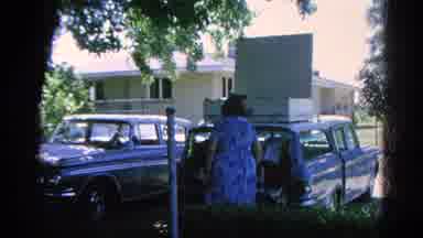 Danville Illinois (1966): Wife Telling His Husband To Grab Groceries From The Car