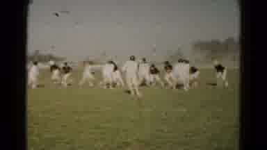 Hagerstown Maryland USA (1966): Game Of Football In An Open Field On A Sunny Day