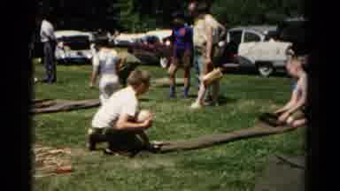Hagerstown Maryland USA (1966): Boy Scouts Practicing Rolling Up Sleeping Bags