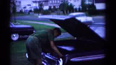 Hagerstown Maryland USA (1966): Boy Scout Fixes Fixes Something In The Trunk Of A