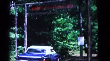 Hagerstown Maryland USA (1966): A Car Driving Through A Camp In The Wilderness