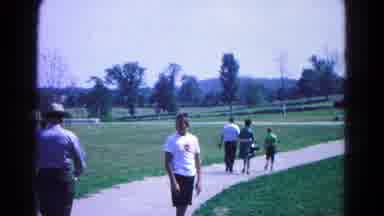 Hagerstown Maryland USA (1966): Boy On Path Through Park Area Being Greeted By A