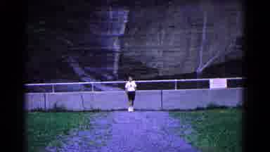 Hagerstown Maryland USA (1966): Person In Shorts Walking A Circle In A Park Next