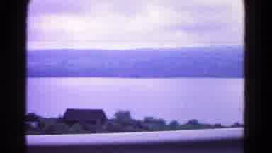 Hagerstown Maryland USA (1966): Moving Shot Of Large Still Body Of Water With Land