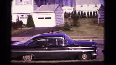 Hagerstown Maryland USA (1966): A Man Getting Into And Reversing A Black Classic