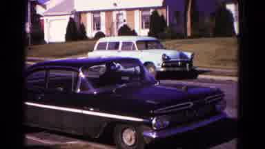 Hagerstown Maryland USA (1966): Black Old Fashioned Car Pulling Out Of Parking