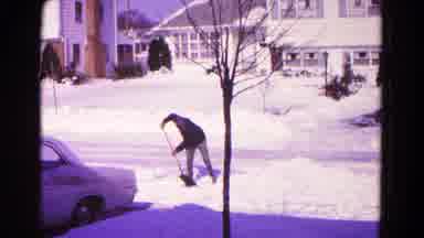 Hagerstown Maryland USA (1966): A Man Shoveling A Huge Pile Of Snow From His