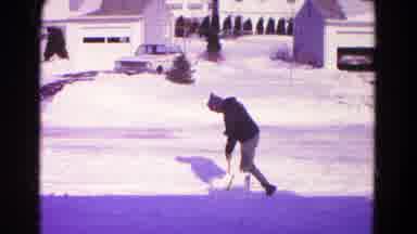Hagerstown Maryland USA (1966): Man Shoveling Snow Outside Turns Into Well Dressed