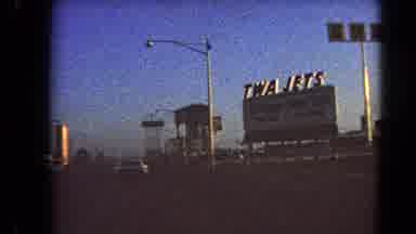 Las Vegas Nevada (1966): View Of Roadside Signs With Blue Sky