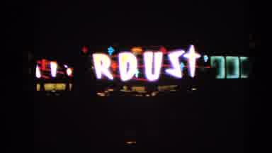 Las Vegas Nevada (1966): View From A Moving Vehicle Of Neon Signs On A Street At