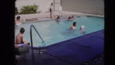 Las Vegas Nevada (1966): People Enjoying Swimming Pool On Sunny Day Building In