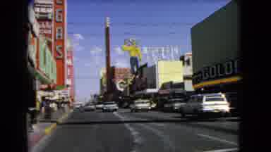 Las Vegas Nevada (1966): Car Driving Past Hotel Showing Old Cars From Another Time