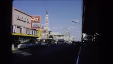 Las Vegas Nevada (1966): A Busy Street With Lots Of Cars And A Big Hotel At The