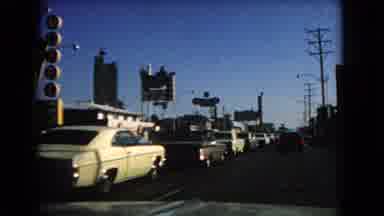 Las Vegas Nevada (1966): Traffic Driving Along Busy Street And Parked In Parking