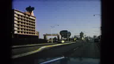 Las Vegas Nevada (1966): Driving Down The Road Looking At Signs And A Large Round