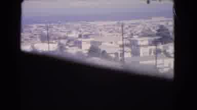Los Angeles California (1966): Looking Through A Window At Rooftops