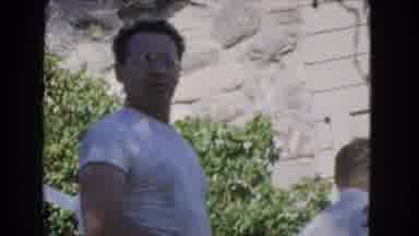 Los Angeles California (1966): Three Men In White Shirt And One Of Them Is Doing