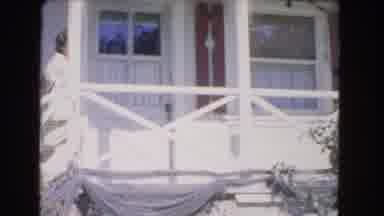 Los Angeles California (1966): Lady Walks Up Stairs On Front Porch Joins Another