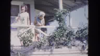 Los Angeles California (1966): Two Women On Balcony Call Down To Man By A Car