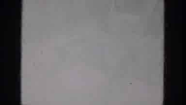Milwaukee Wisconsin (1966): Three People That Are Relaxing Outdoors In A