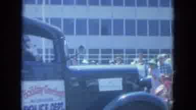 Milwaukee Wisconsin (1966): An Old Truck Going Through A Parade Followed By A