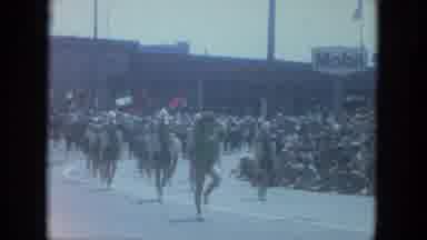 Milwaukee Wisconsin (1966): Elephants Wearing Cone Shaped Hats And People Walking