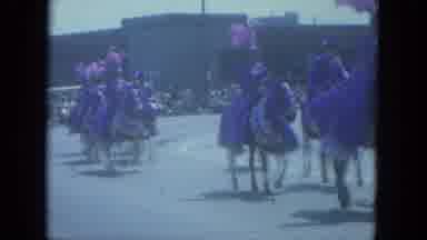 Milwaukee Wisconsin (1966): People Sitting Around The Road Watching As The World