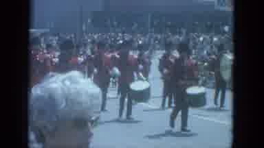 Milwaukee Wisconsin (1966): A Band Plays And Marches On A Street And The