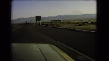 Nevada USA (1966): Old School Video Driving Down Highway Past A Sign With