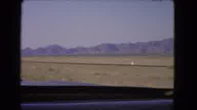 Nevada USA (1966): View Of Mountains In The Distance As Seen From A Passing Car On