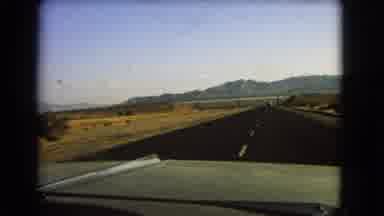 Nevada USA (1966): Landscape View Of Upcoming Road Viewed From Automobile's Front