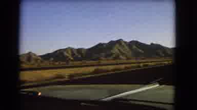 Nevada USA (1966): A View Of Mountains Grass Nature From A Moving Vehicle