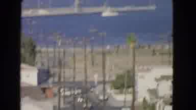 San Pedro California USA (1966): Military Ship Filmed From The Shore Lined With