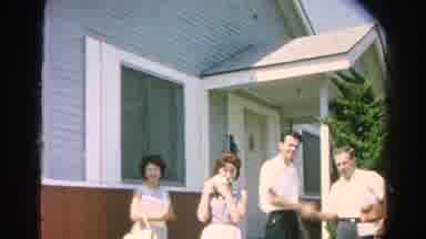 Silver Lake California (1966): Young Man Shaking Hands With An Older Man And A Cat